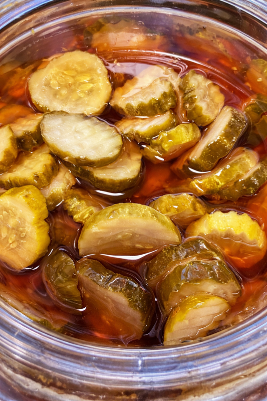 Cucumber pickle chips in mexican chamoy sauce