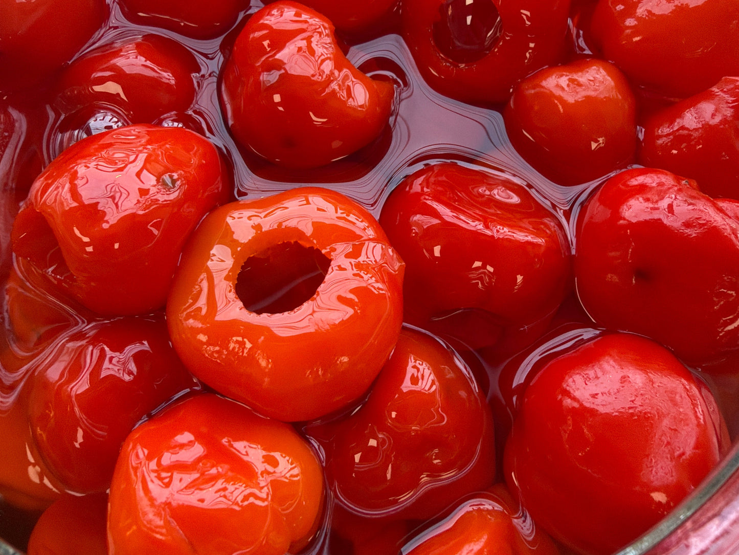 Glass jar filled with red peppadew