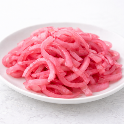 pickled red onions, thinly sliced, sweet and tangy, ready to serve